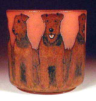 Sitting Airedales