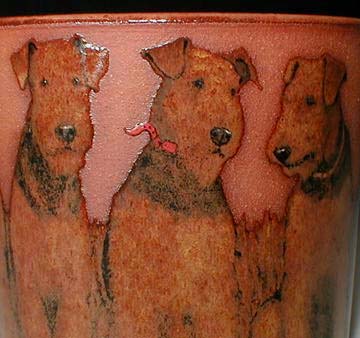 Sitting Airedales